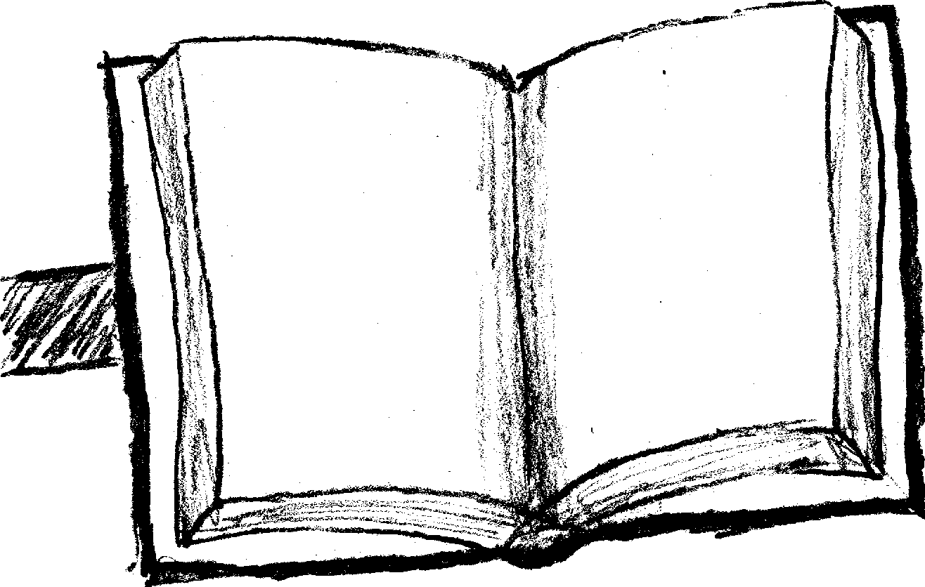 A book, open, on a wooden desk.